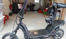 Black Schwinn Electric Scooter, 2006,&nbsp;excellent condition..did not get much use!. Sold with charger and helmet.