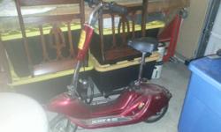 Red Scoot N Go Battery operated scooter perfect for that neighborhood teen. Needs new battery and lots of over looked love.