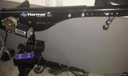Harmar Scooter/Mobility Lift with Remote Swing Arm that will lift scooters or electric wheelchair. Fits most mini vans and suvs. Call .