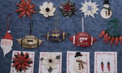 Cajuns Ornaments made from Real Crawfish Claws,Crabs Shells,Garfish Scales,Redfish Scales.
in South Louisiana Cajun Country all from the Gulf of Mexico. Go to www.cajunornaments.com/
see our specials too. Buy 5 get 1 Free