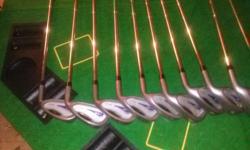 Ii have a set of golf clubs z touring irons 3 thru 9. sandwedge pitching wedge and putter. Also comes a King Cobra driver SS3 plus also a tiltlest starship driver. comes bag and acessories