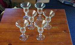 Set of six glass parfait/sherbet glasses in fantastic condition! No chips or scratches. Decorative footed base. Pretty for your next special occasion.