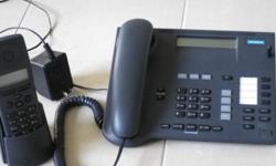 2.4 GHZ STATION WITH 4 HAND WIRELESS PHONE STATIONS. USED BUT IN GOOD CONDITION.