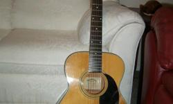 &nbsp;This guitar was recently set up,&nbsp;and a&nbsp;small crack on the bridge was professionally repaired at that time.&nbsp;The guitar&nbsp;plays like silk and&nbsp;has a great sound. It comes with a case. Play it; you'll like it.