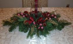 Silk flower arrangements, wreaths, bows, Christmas centerpieces and much more all custom designed to coordinate with your home decor themes and styles. Please email for prices/more information.