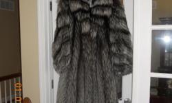 Full length silver fox fur coat with special markings. Purchased from
Arthur's Fur Co. Appraised at $5,900 in 2007. Firm price of $995.
Must see to believe. Images are front and back.