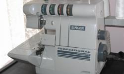 This is a used Singer finishing touch portable serger with accessories and additional thread. It is in excellent condition with very little usage.