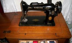 nice singer sewing machine, would be good for someone wanting learn to sew, asking 35.00 , beautful sewing .lot of part to go with it. please e mail. like i said it would be good sor some one wanting to start sewing. only reason im getting rid of it down