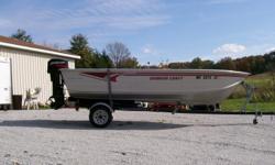 16' smokercraft super fish aluminum fishing boat. 6' width at widest point, 30" deep. Has side remote throttle, stick steer and oar locks. 2004 mercury 25 hp electric start 2 stroke engine. Karavan trailer with dolly wheel. This boat has always been kept