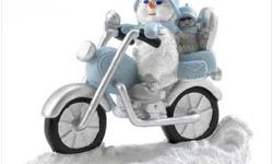 Super-cool snow dude pilots his chopper through the drifting snow, his faithful furry passenger along to enjoy the ride. Even snowmen have a wild side!
Specification
Weight: 0.5 lb.
4Â¾" x 2" x 3Â¾" high.
Polyresin
&nbsp;