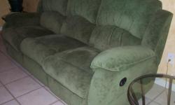 Great condition, green microfiber. Sofa has 2 recliners, love seat has 2 recliners and there is a rocking recliner. Will only sell set, not separate. Selling to buy sectional.
