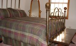Solid Brass Antique Reproduction Four Poster Bed, The bed is full size and has a headboard, footboard and rails. We bought this bed over 30 years ago and it was displayed in a extra bedroom.&nbsp; The bed is in very good condition but does need to be