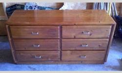 I have a solid wood queen bedroom set for sale. This set was made by Wrights Furniture Mill in South Provo, Utah. It includes a 6 drawer dresser with mirror, 2 storage shelfs, 2 light bridges, headboard with storage, and bed frame. There are a few nicks