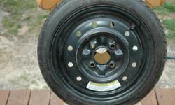 This spare tire is a max speed up to 50 mph, Size T125/70015 Tread 3 ply nylon, 4 lug nut holes. Max Load 1521 lbs.
