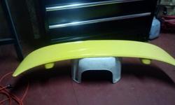 Yellow spoiler this is off a 2007 cobalt SS but it will fit a lot of chevys its used but looks new its a lower spoiler it looked good on my car buti just wanted a bigger one this spoiler they want 160.00 for it. if u want more info. email me or call.
