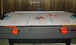 Sportcraft 7ft Airhockey table....includes 3 pucks....2 paddles....electronic scoreboard....excellent condition...Marquette Michigan....