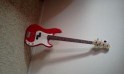 This Squire RED Bass also has a Case..Check other listings.