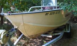 This is a Alum Boat with Center Consul -Galv Trailer with Winch -also a bimini top not shown - No Motor -all for $2250