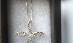 18 inch sterling silver box style chain necklace with silver topaz gem cross brand new in box selling 9am - 6pm&nbsp;no shipping cash only.