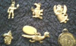 6 small stirling silver charms you can call for these items, selling time 10am - 6pm.