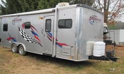 LIST PRICE HAS BEEN DISCOUNTED
WAS $19,450 NOW $ 16,450
8X24 RAMP DOOR - 4,000# CAPACITY, TORSION AXLES WITH RADIAL 5 STAR ALUMINUM WHEELS, LED LIGHTNING PACKAGE, 6 cu. FT REFRIGERATOR, MICROWAVE, FOLD DOWN FULL SIZE BED, ROCK GUARD DIAMOND PLATE, D-RINGS