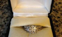 Incredible 14ct white gold diamond engagement ring. Ring contains 67 round cut diamonds to equal a total of 1 3/8 ct total weight. Comes with a full warranty to Kay Jewelers (re-sizing, diamond work, replacement of diamonds, etc.) Ring is sized at a 5