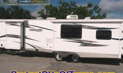 This fantastic travel trailer by Prime Time will have your wanting to hit the open road to adventure every time you see it! Thanks to having three slides room will never be a problem! Relax in your rocking recliners while watching the built in flat screen