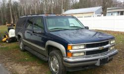 1999 SUBURBAN LT HD WITH VERY LOW MILES ONLY 133000 !!!!!!! 5.7LITER AUTO!!!!!!!!!!!!!!!!!ON IT WITH ALL THE OPTIONS LEATHER& POWER SEATS WINDOW LOCKS AND FRONT & REAR HEAT AND A/C AND 3RD SEAT RUNNING BOARDS AND ETC this is in EXCELLENT CONDITION. A