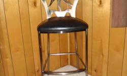 I am selling a custom made sun barstool that I purchased from Contempo Concepts. It has a leather cushion and is in excellent condition. This barstool was used as a accent piece in a room.