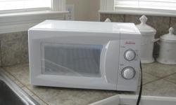 Small microwave oven.&nbsp; Great for college student.&nbsp; Dial temp and timer.&nbsp; Call 704-2222.