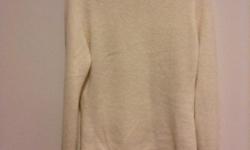 cream color turtleneck sweater with front pocket located at waist.
Designer: Jordache 67% acrylic 30% nylon 3% spandex
Teen Size:7 /9 &nbsp;