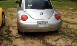 2001 Silver Volkswagen Beetle, 1.8 L Turbo GL , 97,500 miles, Automatic Transmission. Great Gas Mileage, light gray cloth seats, new headliner, new carpet. Tinted windows, new windshield. Drives Great. A really fun car to drive.