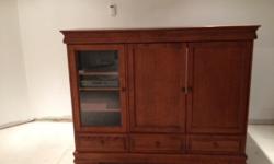 Beautiful Solid Wood T.V armoire purchased at Mobilart