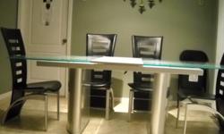 BEAUTIFULL GLASS TABLE-DINNER
EXPANDE IT FOR 8 - 10 PEOPLE
WITH 4 BLACK LEATHER CHAIRS
CALL 239 258-7366