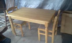 Table and only #2 Chairs--REAL WOOD A YELLOWISH COLOR--LOCATED IN sHELBY oHIO
