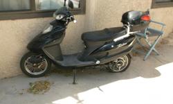 Paid $800.00 in 2013, asking $300.00 obo.&nbsp; Moped has flat rear tire.&nbsp; New battery.&nbsp; Electric charger "NO GAS".&nbsp; 15 mile range @ 15 mph.