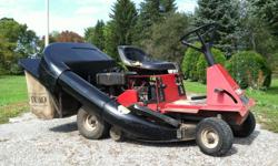 Taro Professional Ride on Mower, 32 inch cut, 11 HP Briggs & Stratton Engine, Twin Baggers 6 Bushal Capacity, Cutter high 6 lever ajustable, 5 speed forward 1 reverse.