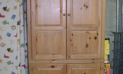 Beautiful Thomasville solid pine armoire with distressed finish in great condition. Measures 78 inches high by 42 inches wide by 25 inches deep. Internal measurements are as follows: Top section measures 39 inches from the top of the armoire to the shelf