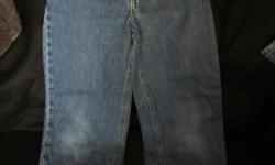 Three pairs of boys jeans, all size 10, in very good condition. These include one pair of Arizona Relaxed fit jeans, one pair of Gap jeans and one pair of Faded Glory jeans. The Gap jeans have a slight bit of wear at the bottom of the cuff, but are in