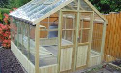 Timber Greenhouse, hand crafted in England. Manufactured, using only selected timber. This Distinctive, Residential Green House, offers a degree of elegance, strength, safety and is aesthetically pleasing in any landscape. The English Greenhouse design is