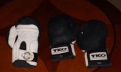tko 12 ounce boxing gloves 2-left hand 1-right hand. $15 CALL AND I WILL MEET U IF CLOSE. (501)391-254 NINE in good shape.