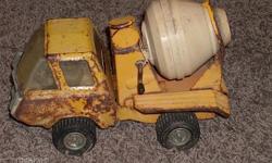This is a vintage tonka truck.&nbsp; It is an 8" long toy with some rust but still in solid condition