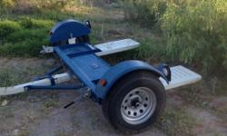 Tow Dolly with new wheel tie downs. Excellent condition great buy @$775.00 Call or Text John @ 801-592-4502