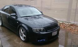 I have a 2002 audi a4 quttaro turbo..standard..that im looking to trade for equal value..bmw..saab..lexus..other audi..or a truck!! automatic..the miles are 147k.. all black with tan interior good condition..angel eyes..new cd/Dvd indash..racing