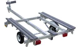 14' 9", fully adjustable boat trailer. Capacity 450 lbs. 1 7/8" ball coupler. Used once.