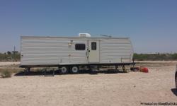 2006 Fleetwood travel trailer in great condition! Has small cut from slide out in the floor and emergency window is cracked but we remove for window unit (window unit is included with trailer) all electrical works fridge, freezer, stove, ext. All works..