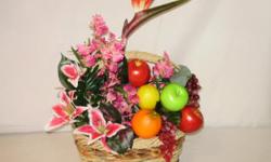 Different various type of flower arrangement. Wall hanging, vases, basket, picture frames all in tropical theme. E-mail me for more selections and prices.