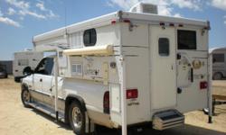 2006 Northstar TC800 slide-in camper fits 6ft to 8ft beds. Queen cabover bed; dinette converts to additional bed; fantastic fan; 3 way refrigerator; dbl s/s sink; water heater w/exterior shower; 2 burner stove; cassette toilet; low profile pop-up with
