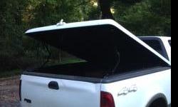 ARE white truck topper. &nbsp;72 inches long, hydrloic lift, good condition. &nbsp;It has a scratches on both back corner.
