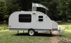 &nbsp;&nbsp;&nbsp; This small light weight Tear Drop style camper is less than 1,200 pounds and can be towed by most cars.
&nbsp;
&nbsp;&nbsp; This unique camper has a pop up section in the front ceiling that allows you to stand up. Fits in any garage .No